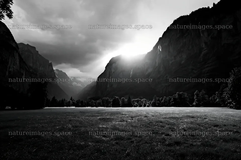 Lauterbrunnen Valley meadow light rays create a scenic view – nature images 9722x6480